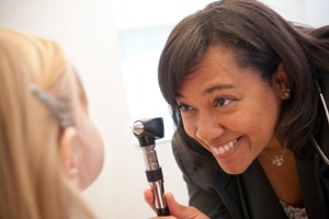 An otorhinolaryngologist checks for ear, nose or throat problems.
