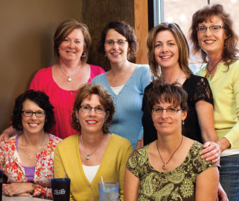 Diane Gerhardt, seated in the middle in the photo, says her friends helped her through treatment for breast cancer by providing emotional support, home-cooked meals and prayers. Pictured with Gerhardt are (clockwise from top left) Shelley Gerhardt, Jennifer Nielsen, Laurie Johnson, Tina Hilgendorf, Sue Ruen and Connie Anthony.