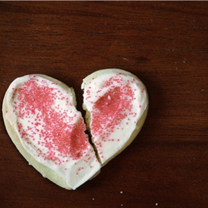 Broken frosted heart cookie