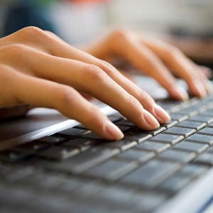 Carpal Tunnel Syndrome Hands on a Keyboard