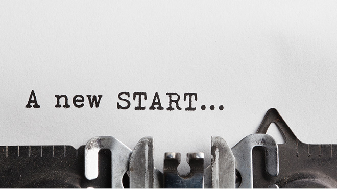 A new start in text on a typewriter