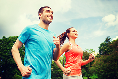 man-and-woman-running-outdoors