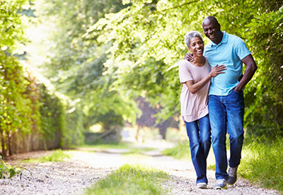 middle-aged-african-american-couple-walking-outdoors