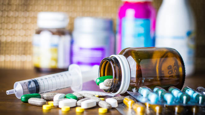Prescription bottle drugs syringe
