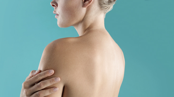 woman with bare upper back