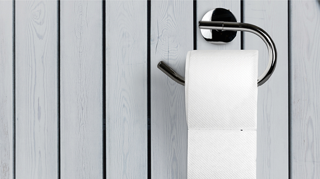 Toilet paper on a wall holder