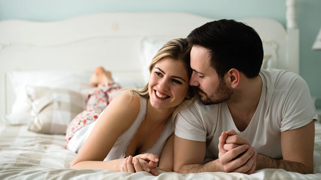 Young couple on a bed
