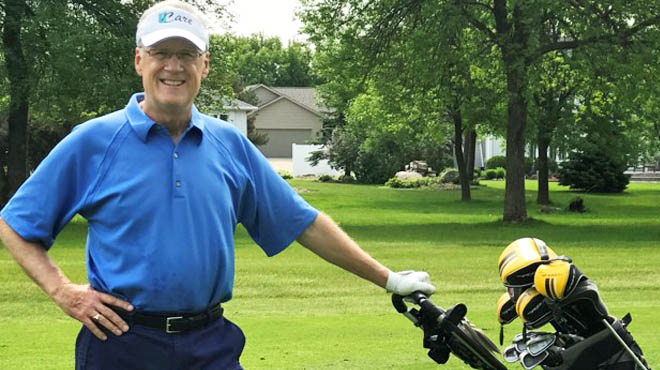 Mark Skrien with golf cart