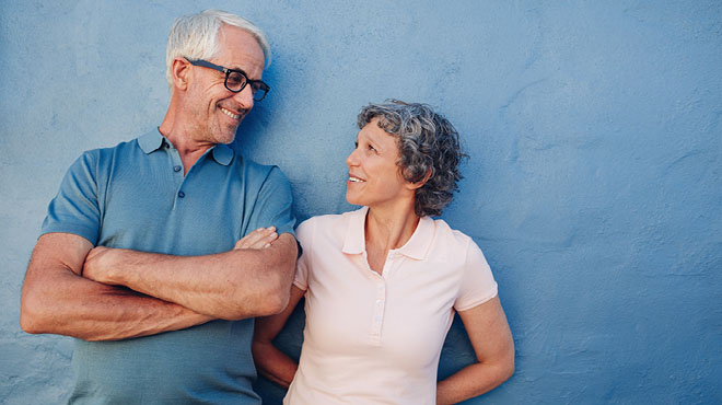 Mature couple smiling and looking at each other