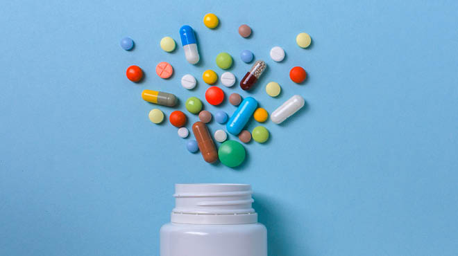Medications above pill bottle