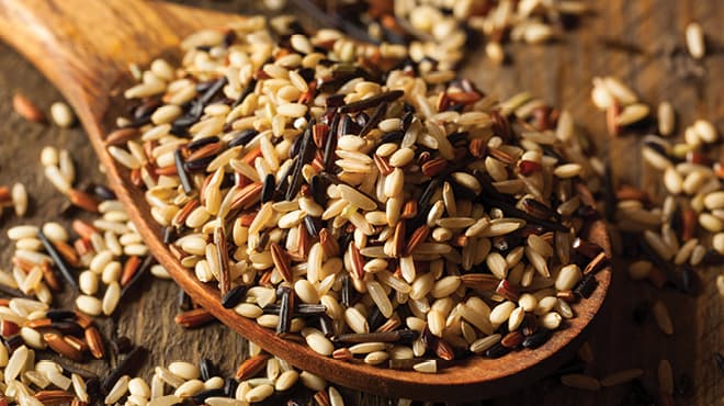 Wild rice on wooden spoon