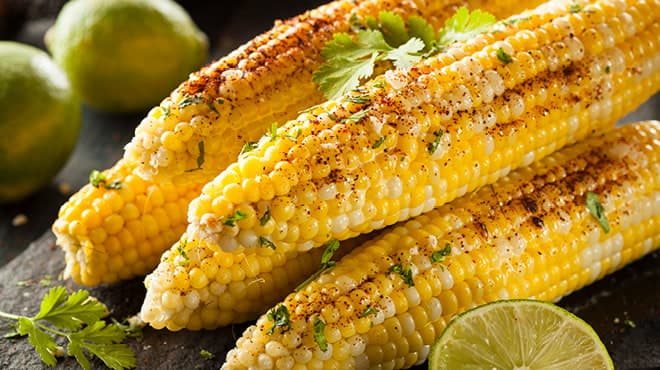 Corn on the cob with limes