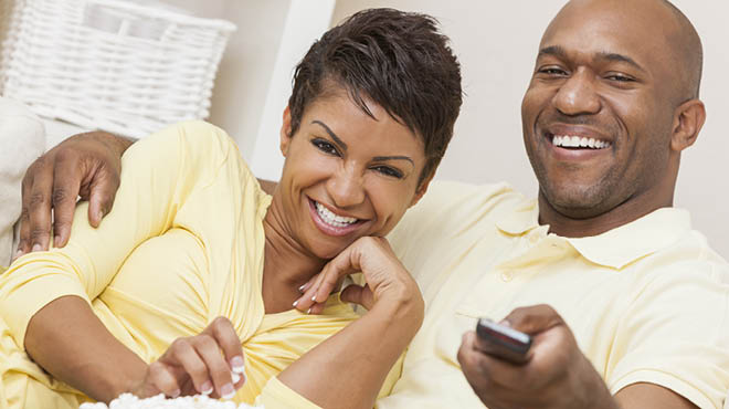 Couple sitting and smiling