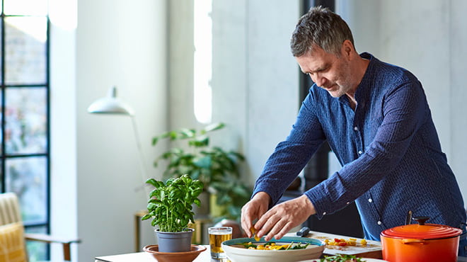 Mixing bowl of veggies on table