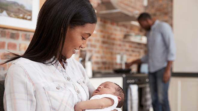 https://www.mayoclinichealthsystem.org/-/media/national-files/images/hometown-health/2021/mom-holding-baby-as-dad-cooks.jpg?sc_lang=en