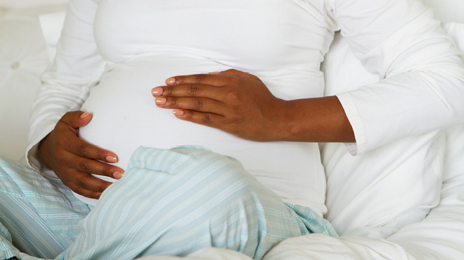 Labor Contractions: How They Feel, When They're Real, and Timing