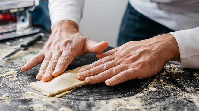 Hands making gluten-free food