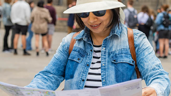 Tourist reading map