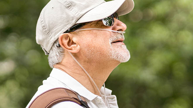 Person outside wearing nasal cannula