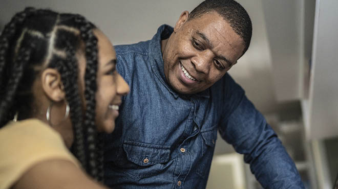 Two people smiling