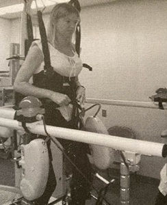 Reese walking in therapy