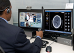Neurologist looking at telemedicine screen