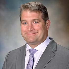 Carl Burkland, M.D.