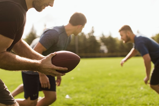 Men playing football